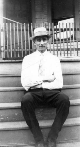 Edward Waag on steps of home around 1925