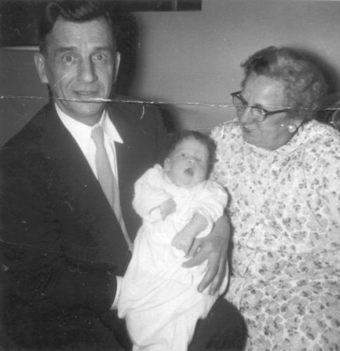 Carl and Clara Beckman with grandchild